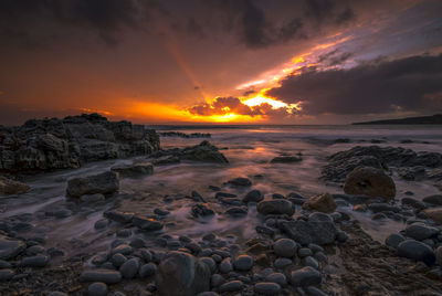 Scenic view of sea against sky during sunset