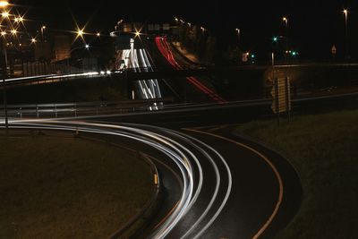 View of bridge in city at night