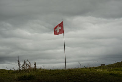 Scenic view of flag against sky