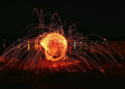 Light trails in sky at night