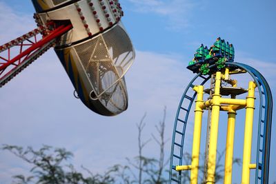 Low angle view of ferris wheel against sky