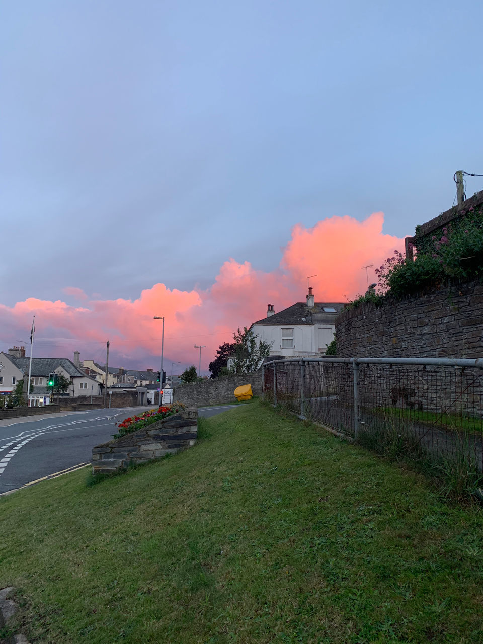 CARS ON ROAD AGAINST SKY DURING SUNSET IN CITY