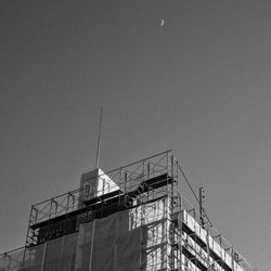 Low angle view of incomplete building against sky