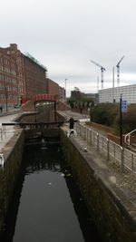 View of canal along buildings