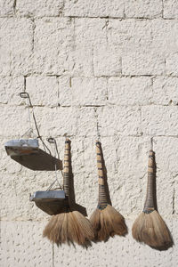 Close-up of clothes hanging on wall