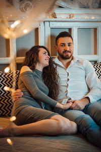 Portrait of smiling young couple