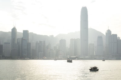 View of buildings in city against sky