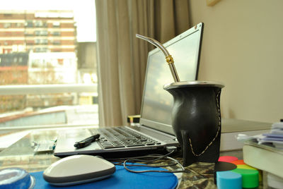 Electric lamp on table at home