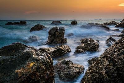 Scenic view of sea against sky during sunset