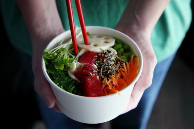 Close-up of hand holding food