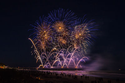 Firework display at night