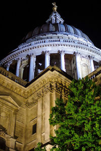 Low angle view of building against sky at night