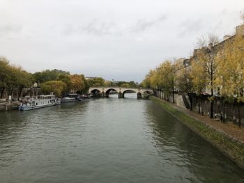 Bridge over river against sky