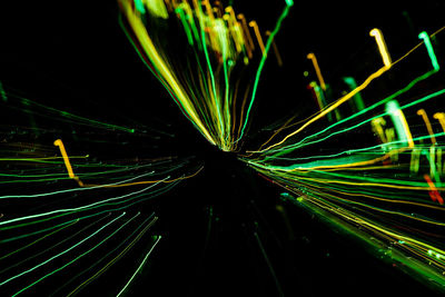 Close-up of light trails against black background