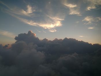 Scenic view of mountains against sky at sunset