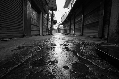 Walkway amidst buildings