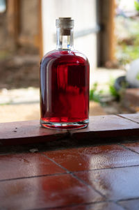 Close-up of drink in glass jar on table