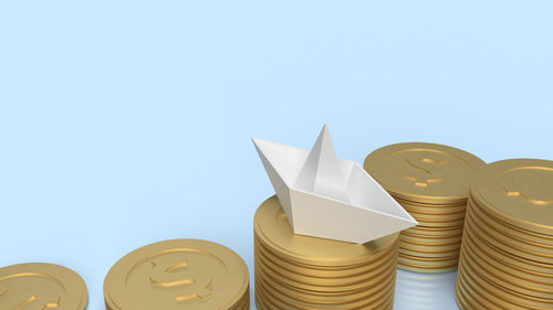 Low angle view of objects against blue background