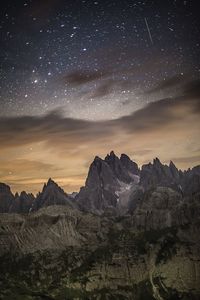 Scenic view of mountains with a sky full of stars