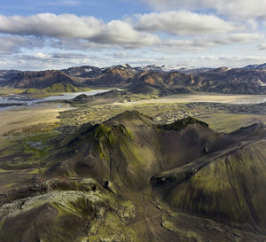 Cloudy sky over mountain ridge