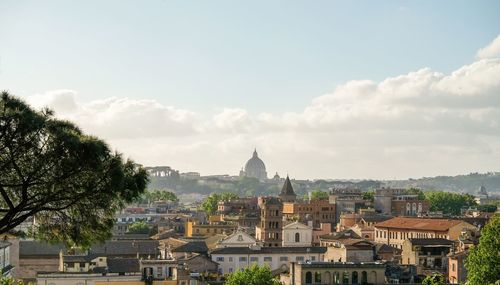 View of buildings in city against sky