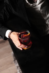 Men and drink cocktail negroni