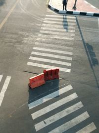 High angle view of road barrier on crosswalk