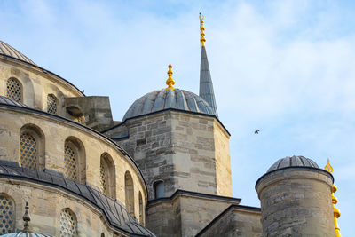 Low angle view of historic building against sky