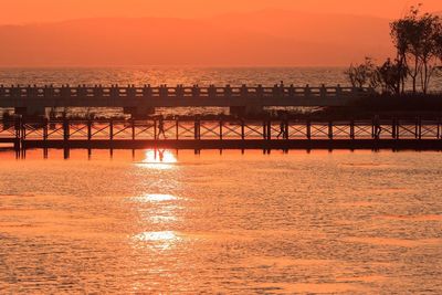 Scenic view of sea at sunset