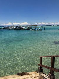 Scenic view of sea against blue sky