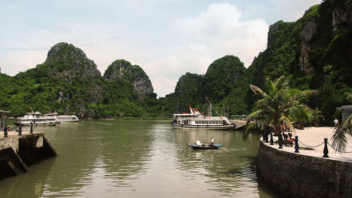 Boats moored on sea