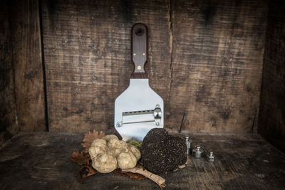 Close-up of food on table against wall