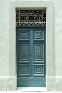 Traditional wooden, vintage painted blue door in malta