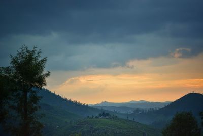 Scenic view of mountains against sky during sunset