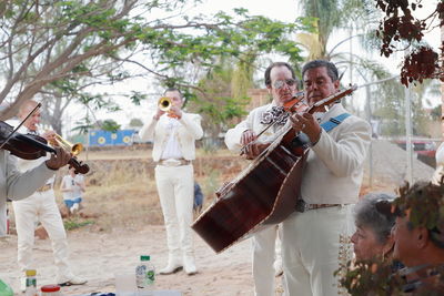 Group of people playing outdoors