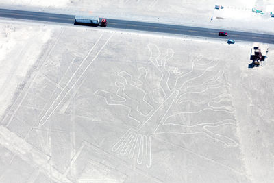 High angle view of vehicles on snow