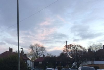 Low angle view of buildings in city against sky