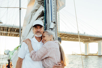 Senior couple travelling on boat