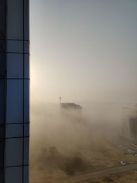 Buildings in city against sky