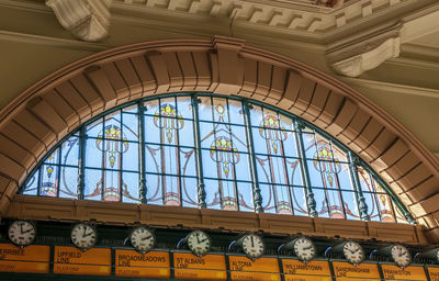 Low angle view of glass window in building