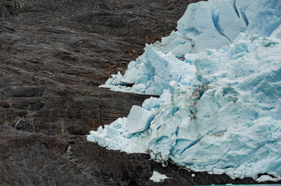 Close-up of ice against rock