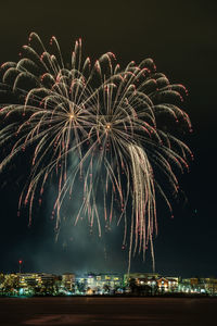 Firework display at night