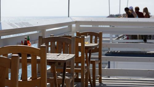 Tables and chairs at terrace restaurant