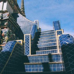 Low angle view of modern building against sky