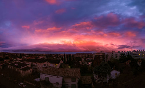 High angle view of townscape against sky during sunset