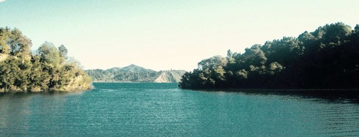 Scenic view of lake with mountains in background