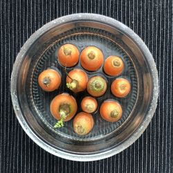 High angle view of fruits in bowl on table