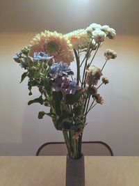 Close-up of white flowering plant in vase