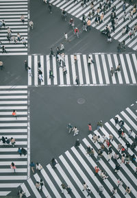 High angle view of crowded walking on zebra crossing