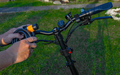 Low section of man riding bicycle